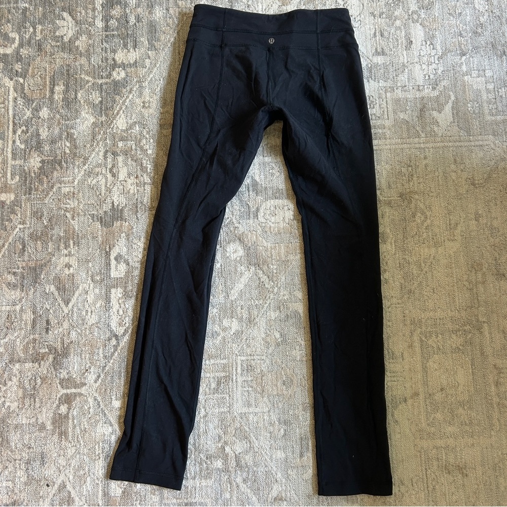 Lululemon straight leg mid rise black leggings size 8